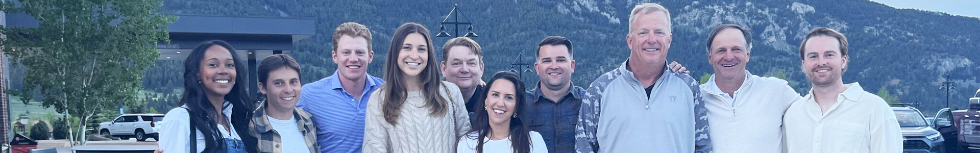 Erben Associates post for photo together at Big Sky