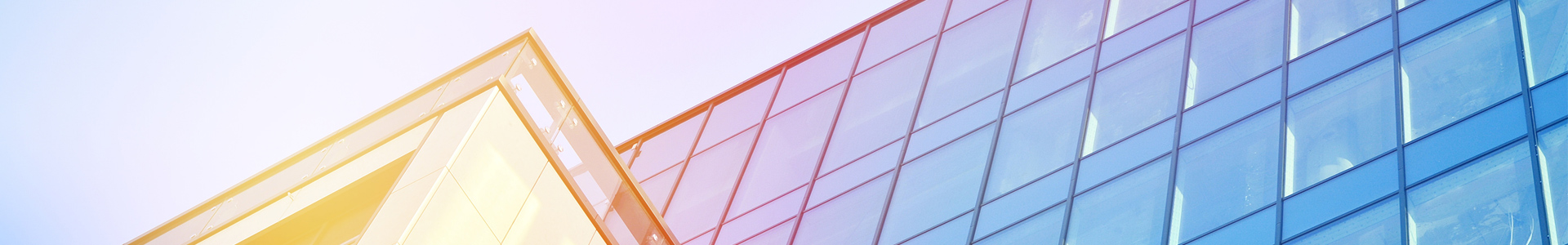 abstract visual of glass building with sunlight
